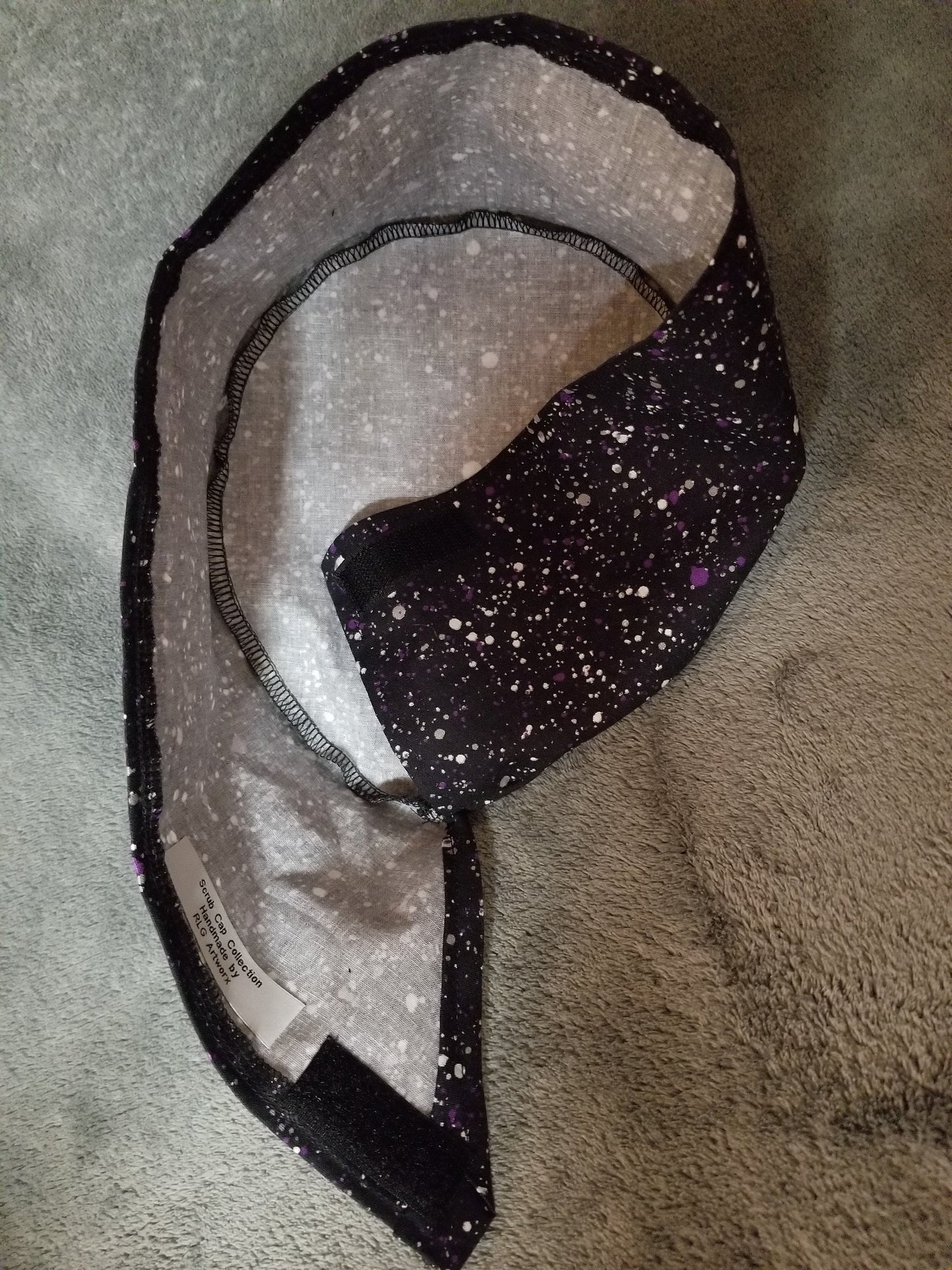 Purple Paint Splatter on Black Background LARGE Scrub Cap with Hook and Loop Fastener
