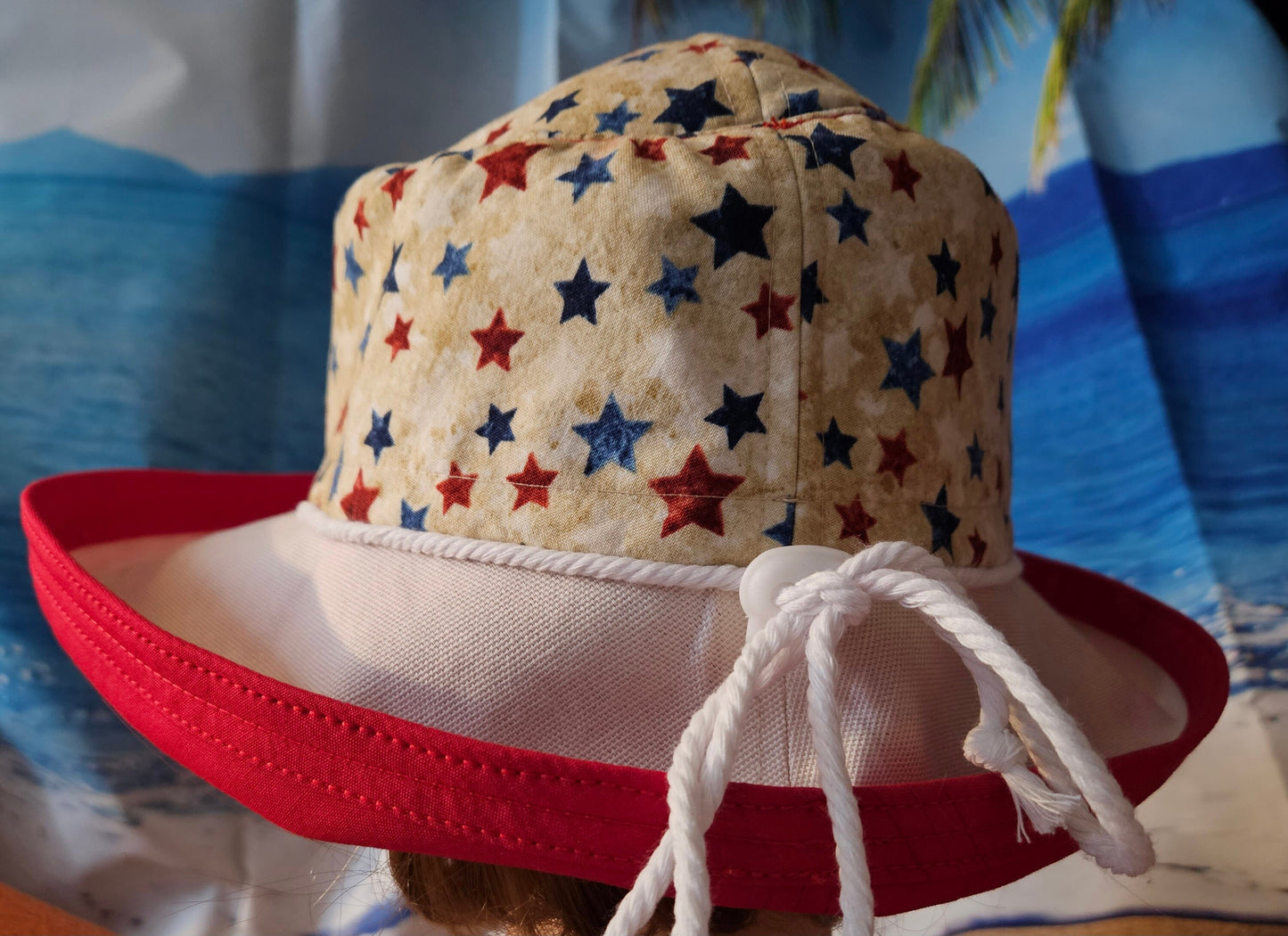 Large wide brim cotton sun hat featuring Red and Blue Stars Print on Cream Background Sunblocker Hat, Summer Hat, Holiday Hat, Vacation Hat
