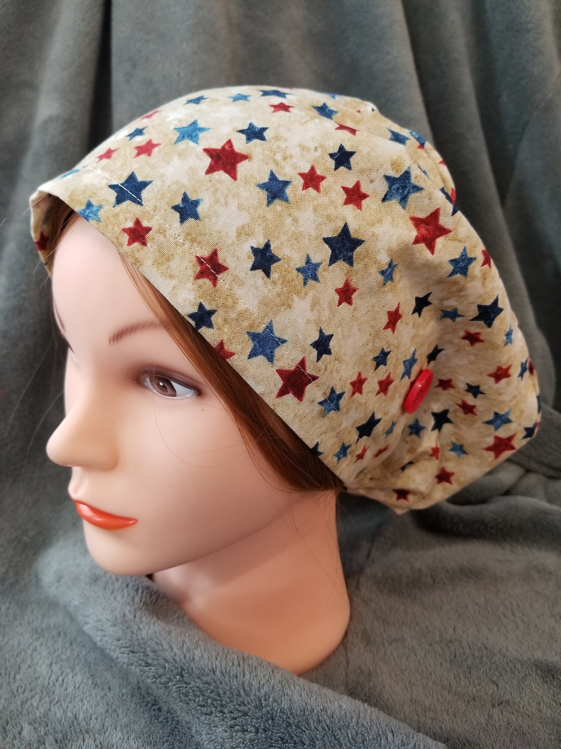 Pixie Style Scrub Cap Beige Background with Red White and Blue Stars, Euro Style Scrub Cap