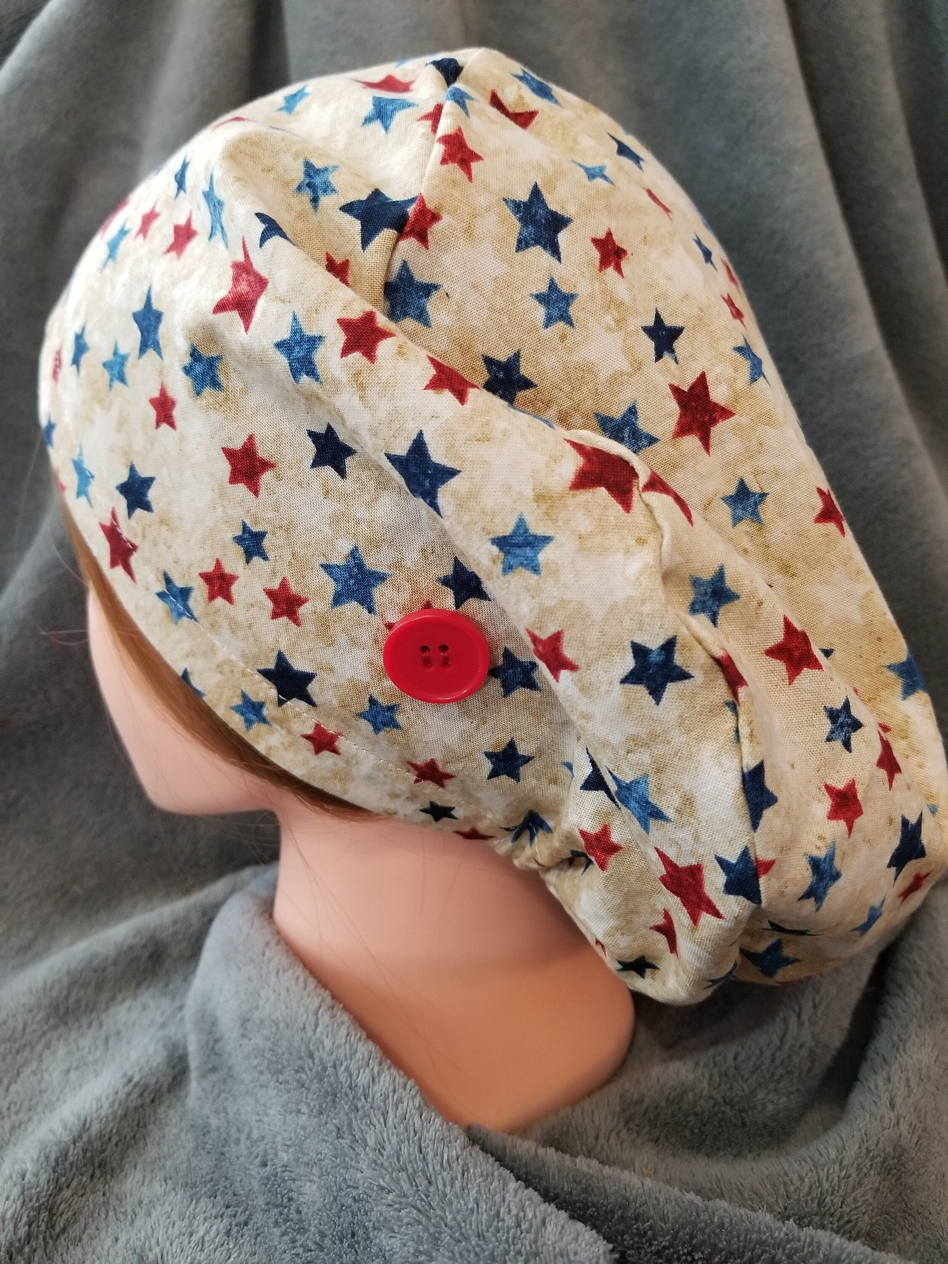 Pixie Style Scrub Cap Beige Background with Red White and Blue Stars, Euro Style Scrub Cap