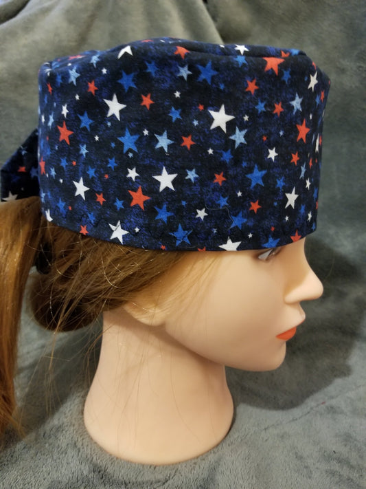 Blue Background with Red, White and Blue Stars Scrub Cap with hook and loop fasteners