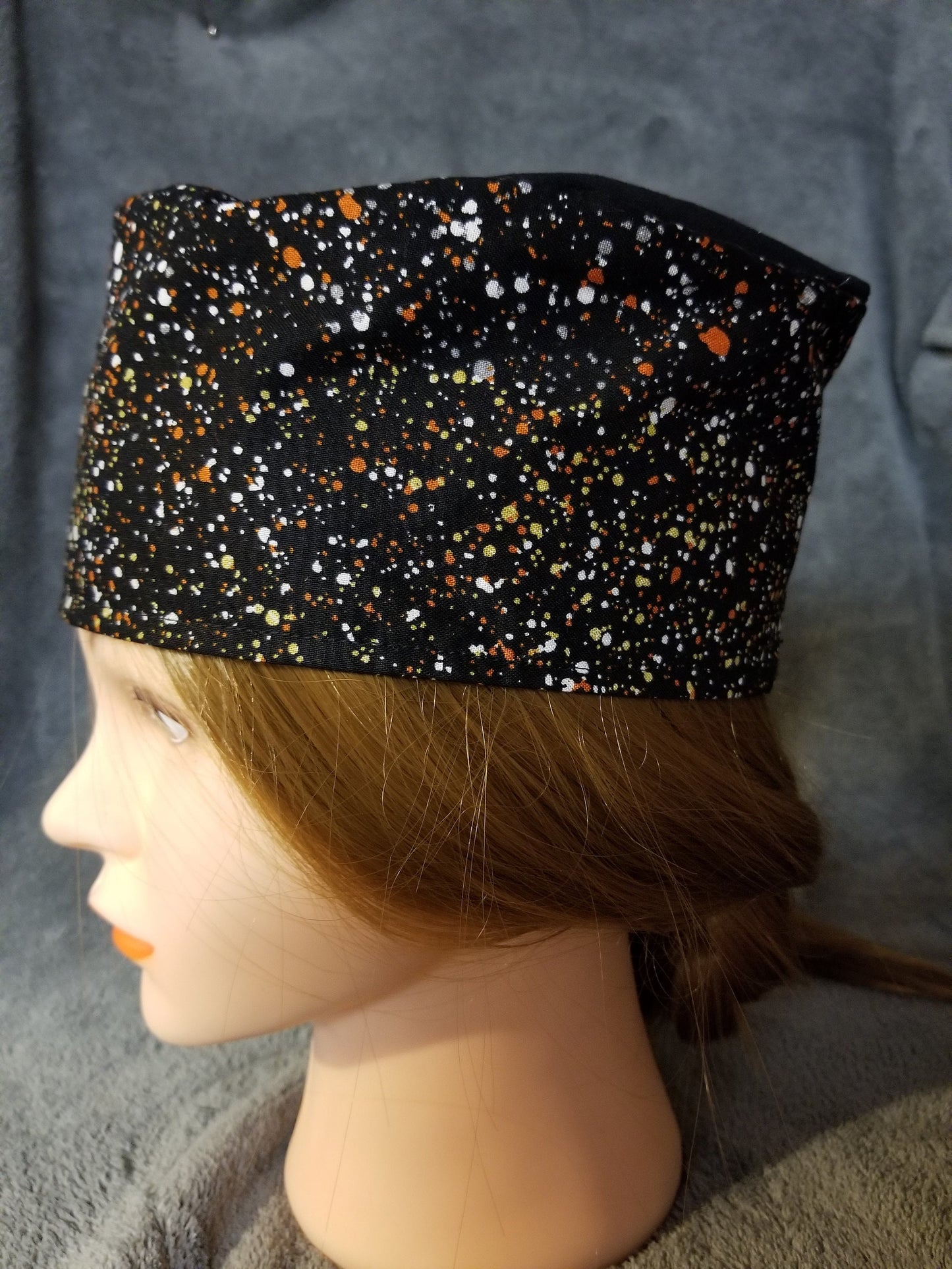 Paint Splatter and Black Crown Print Scrub Cap with hook and loop fasteners