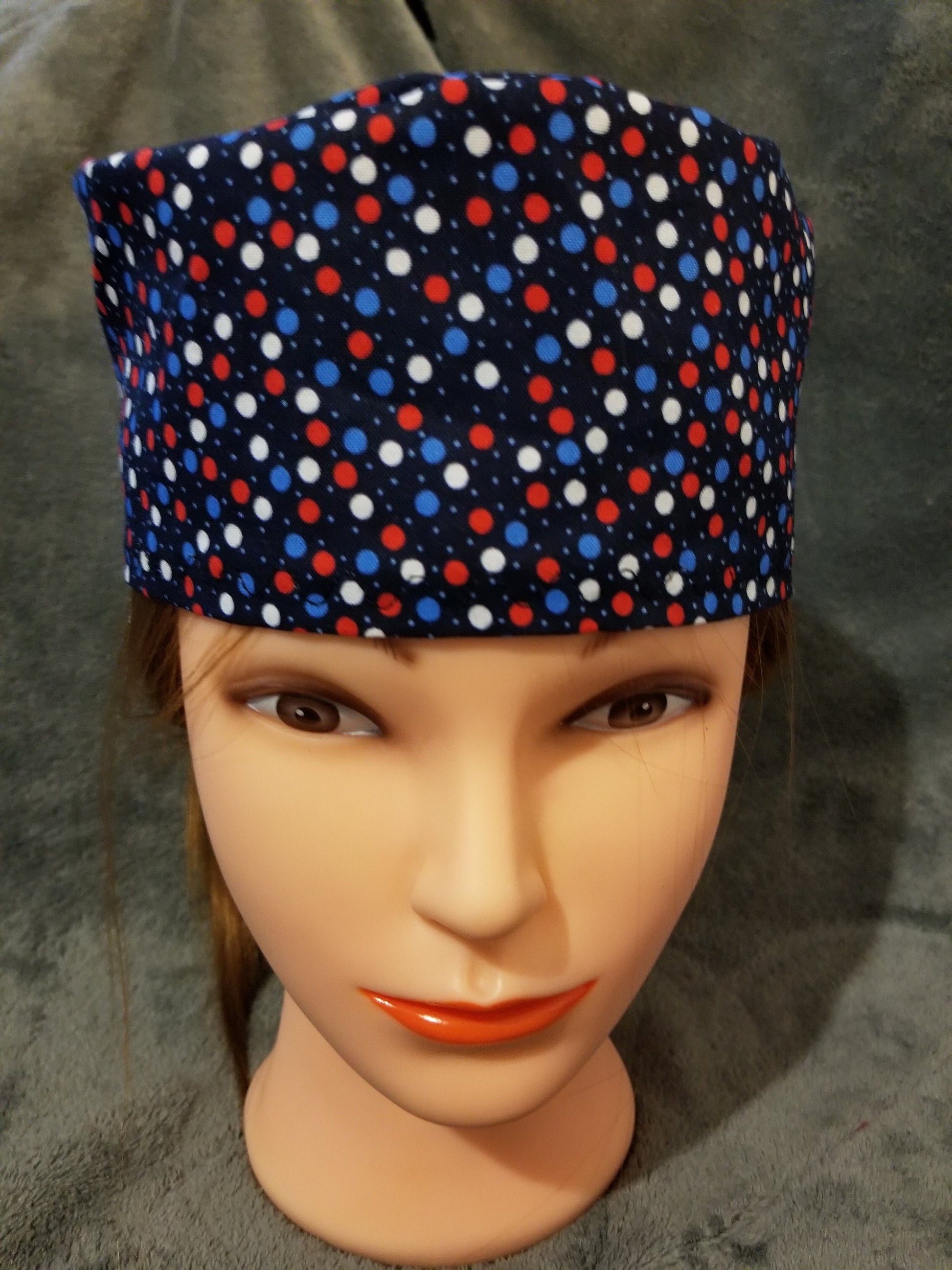 Blue Background with Red, White and Blue Dots Scrub Cap with hook and loop fasteners