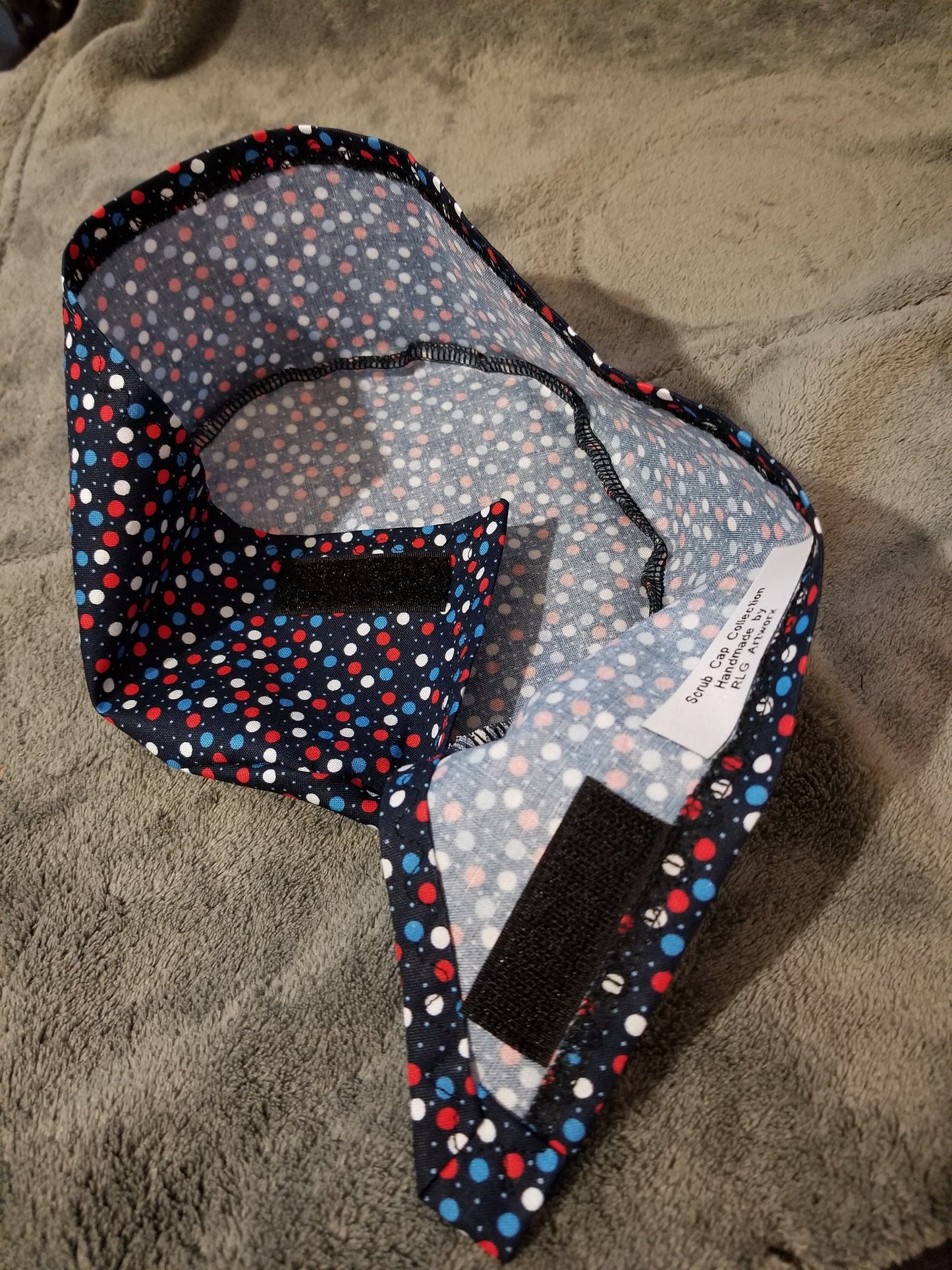 Blue Background with Red, White and Blue Dots Scrub Cap with hook and loop fasteners