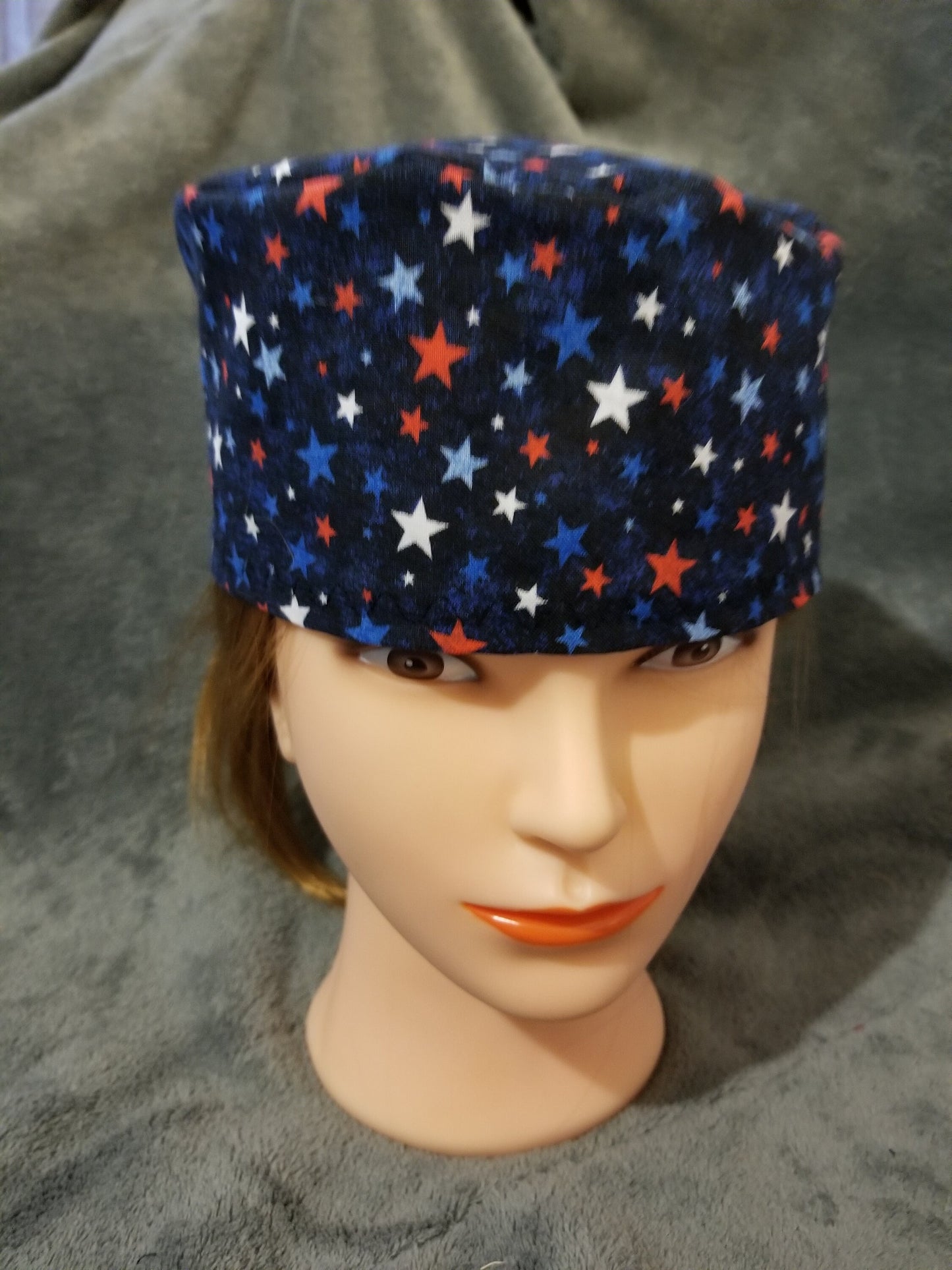Blue Background with Red, White and Blue Stars Scrub Cap with hook and loop fasteners