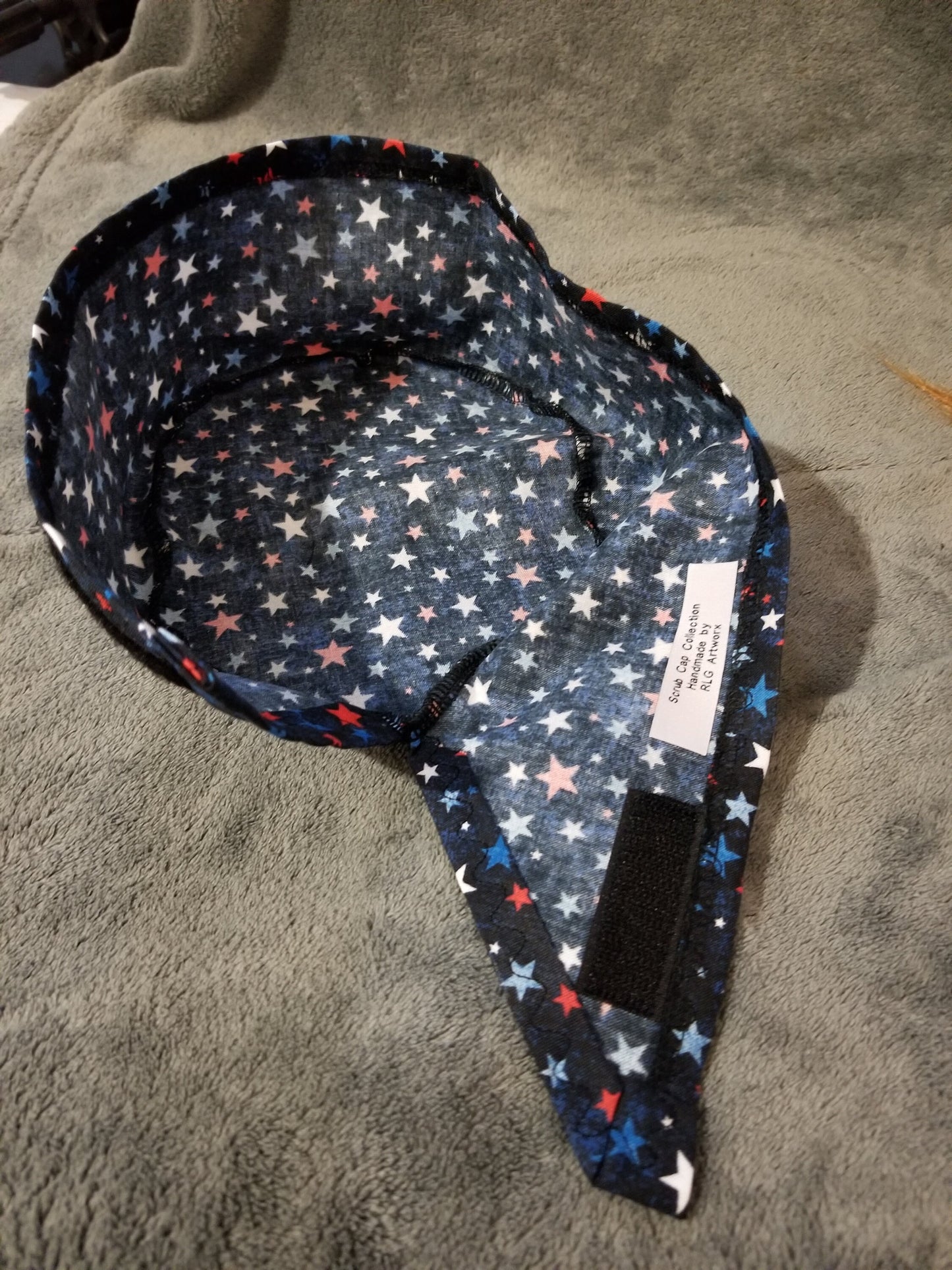 Blue Background with Red, White and Blue Stars Scrub Cap with hook and loop fasteners