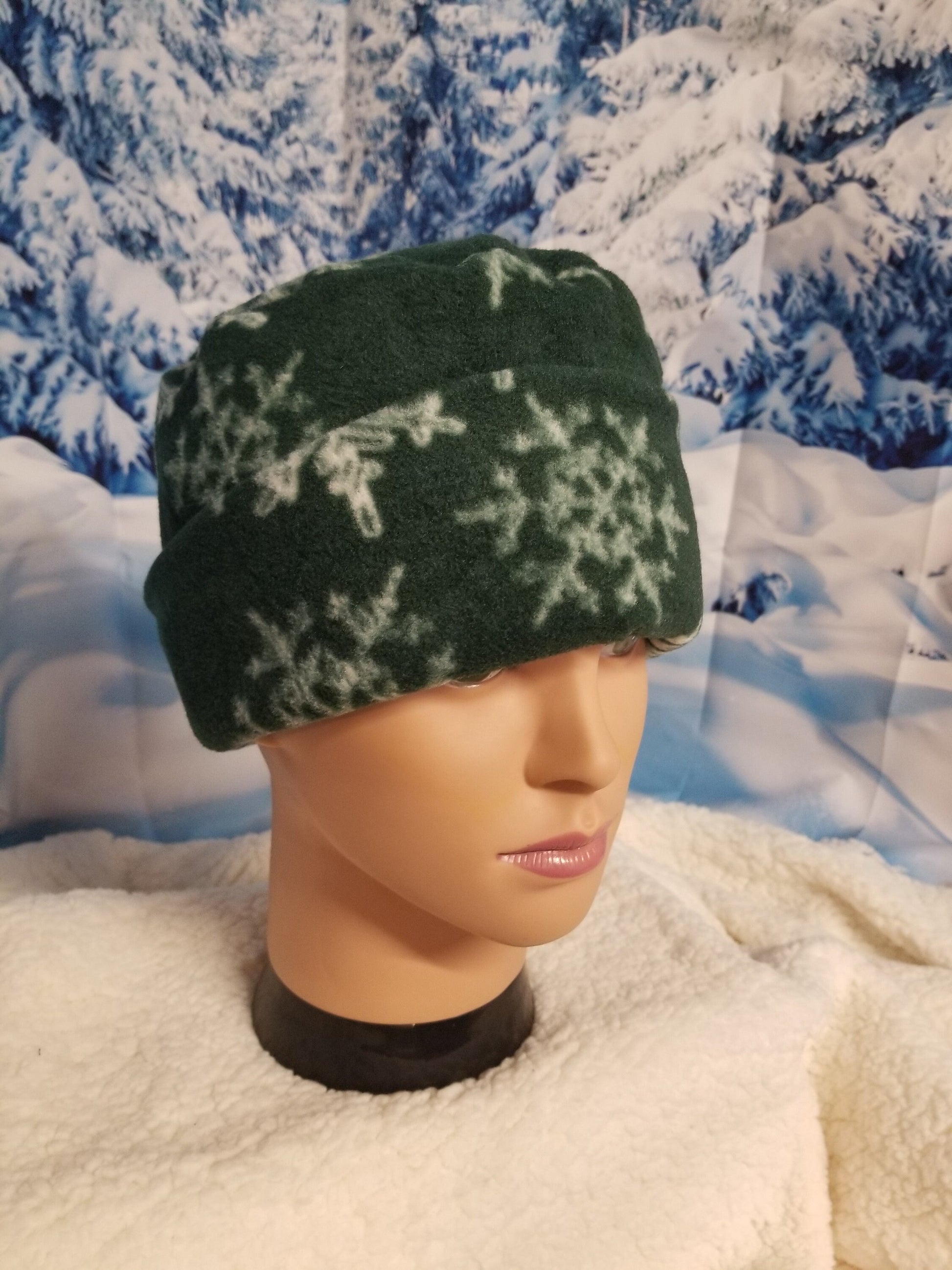 Green Background with White Snowflakes Fleece Winter Pillbox Hat