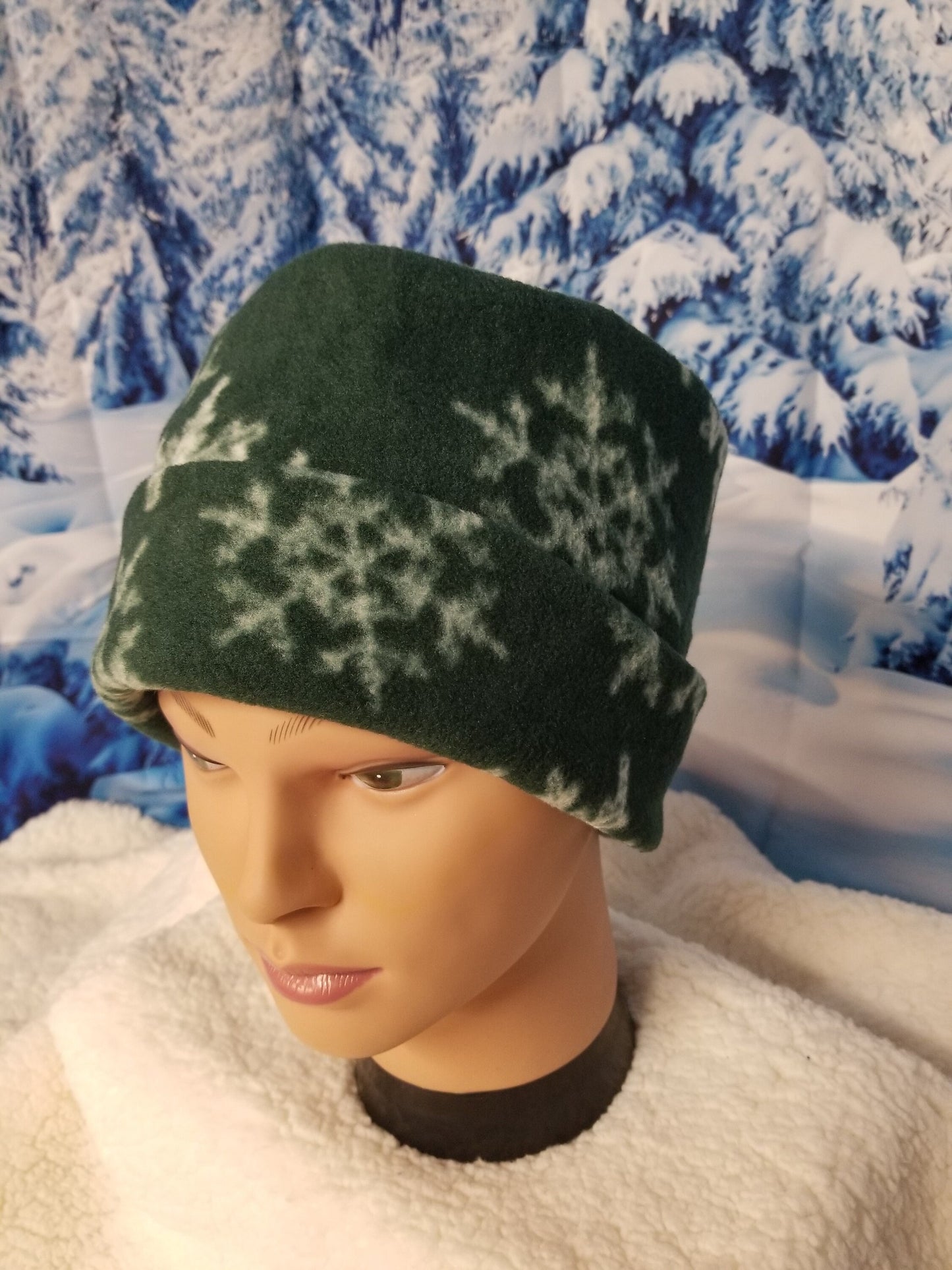 Green Background with White Snowflakes Fleece Winter Pillbox Hat