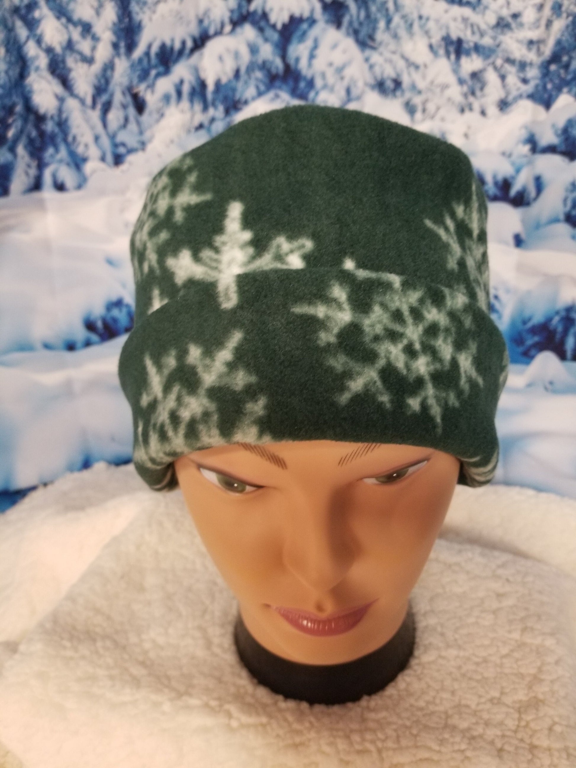 Green Background with White Snowflakes Fleece Winter Pillbox Hat