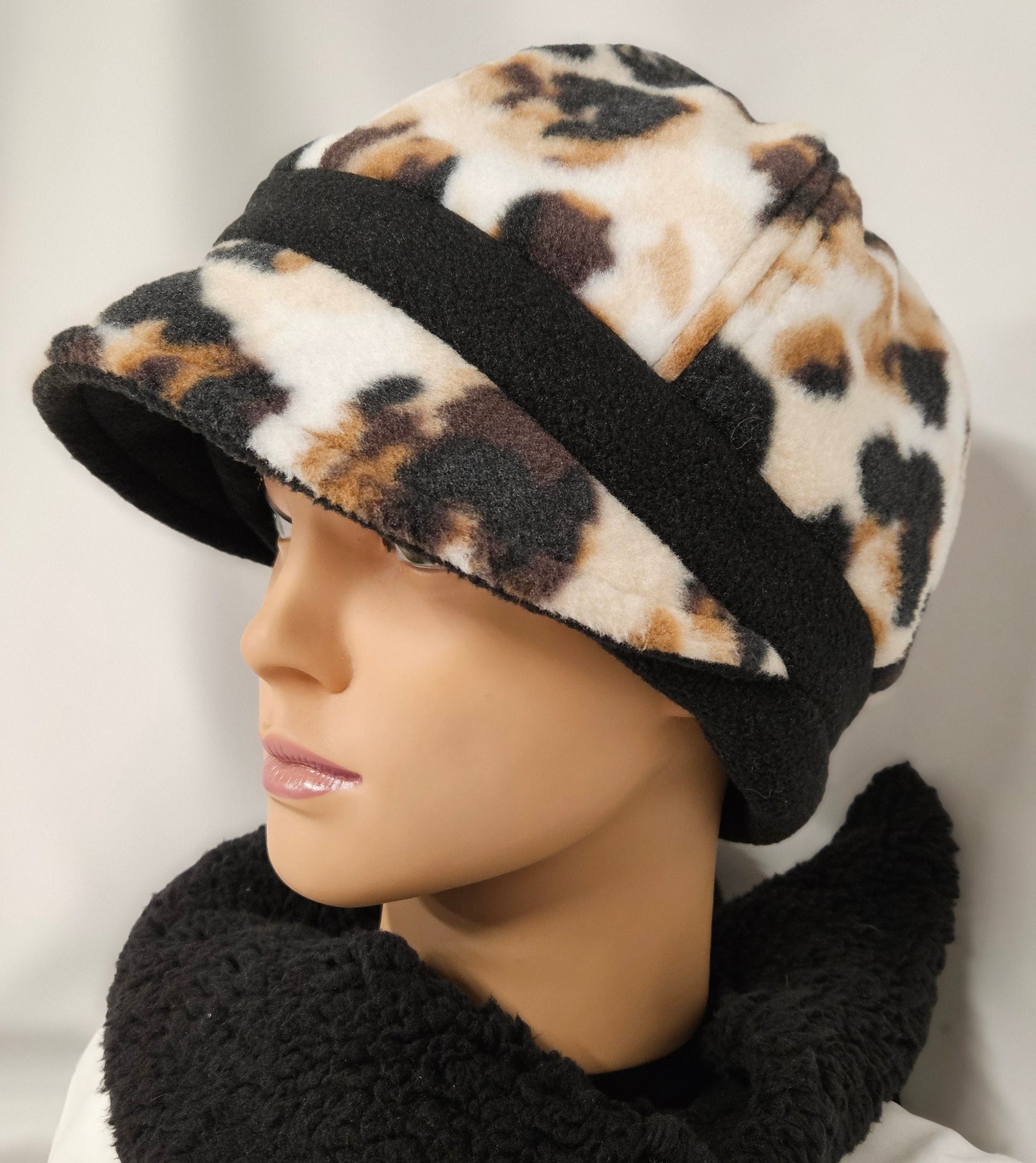 Animal Spots Fleece Fall and Winter Fashion Hat with Animal Spots Visor and Black Band and Ear Warmer; Women's Fleece Hat with Visor